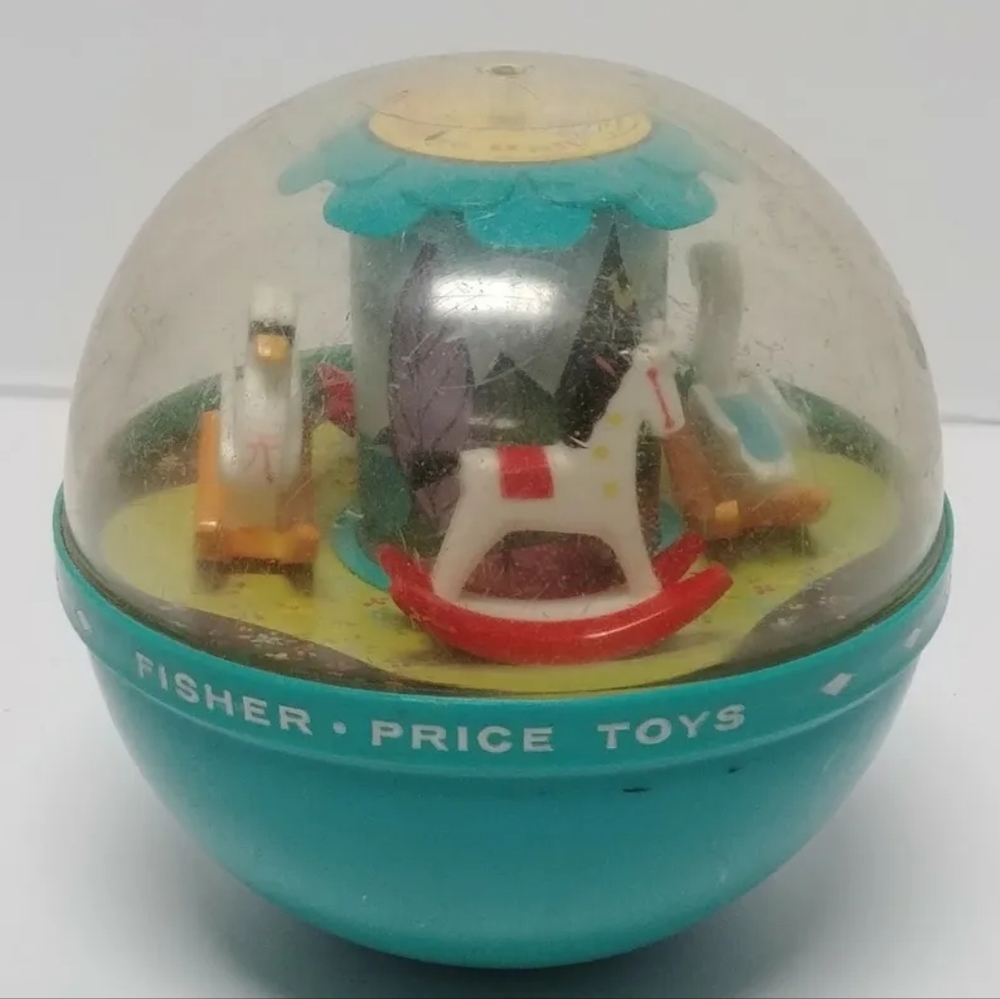 Vintage Fisher Price Roly Poly Chime Ball. No.165